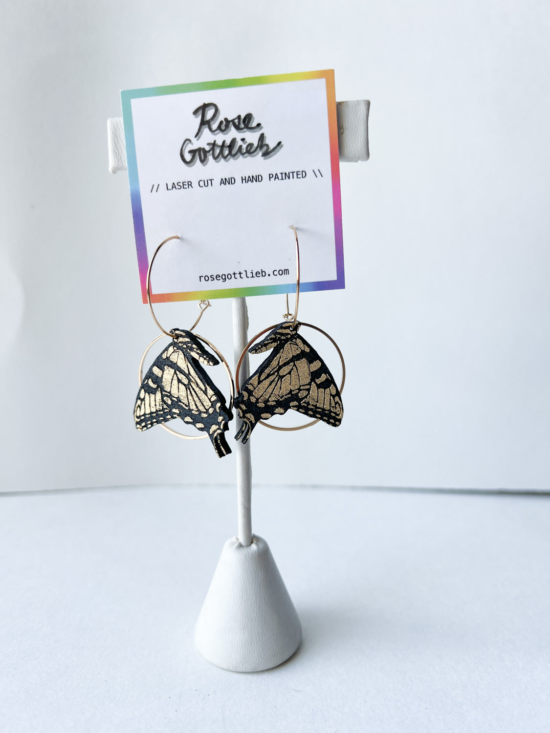 Rose Gottlieb Earrings - small black and gold swallowtails with circles