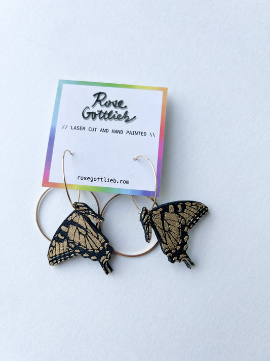 Rose Gottlieb Earrings - small black and gold swallowtails with circles